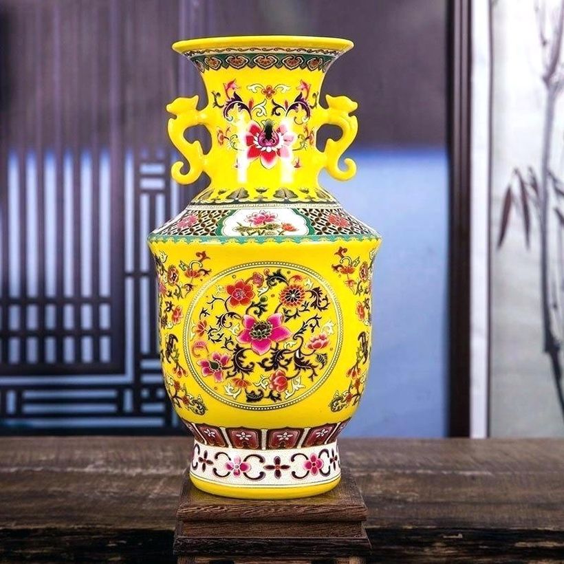 Modern-living-room-ornaments-yellow-ceramic-vases-with-unique-motifs-to-make-it-look-fancy-for-decorating-your-living-room