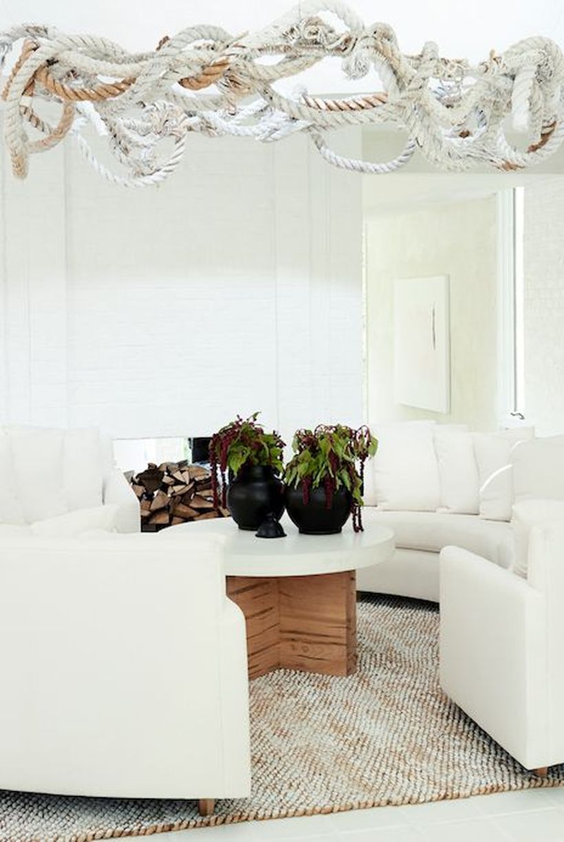 Round-coffee-table-and-white-sofa