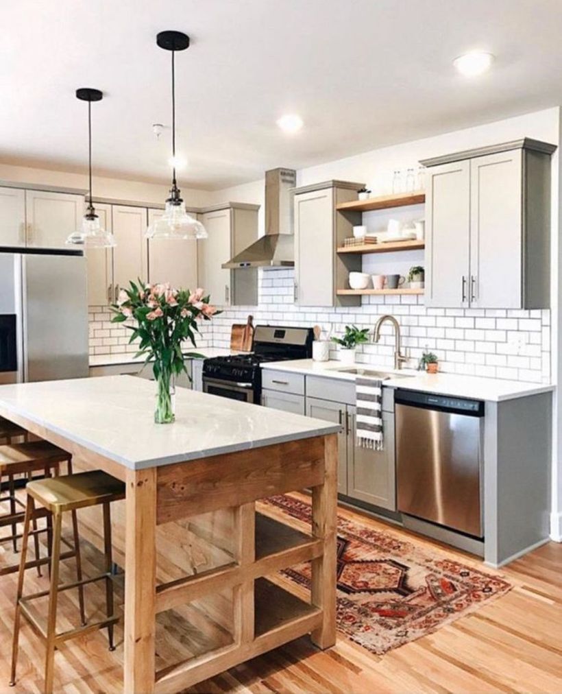Rustic-kitchen-design-with-gray-kitchen-cabinet-wooden-kitchen-table-and-chair-wooden-vinyl-floor-added-bohemian-motif-rugs