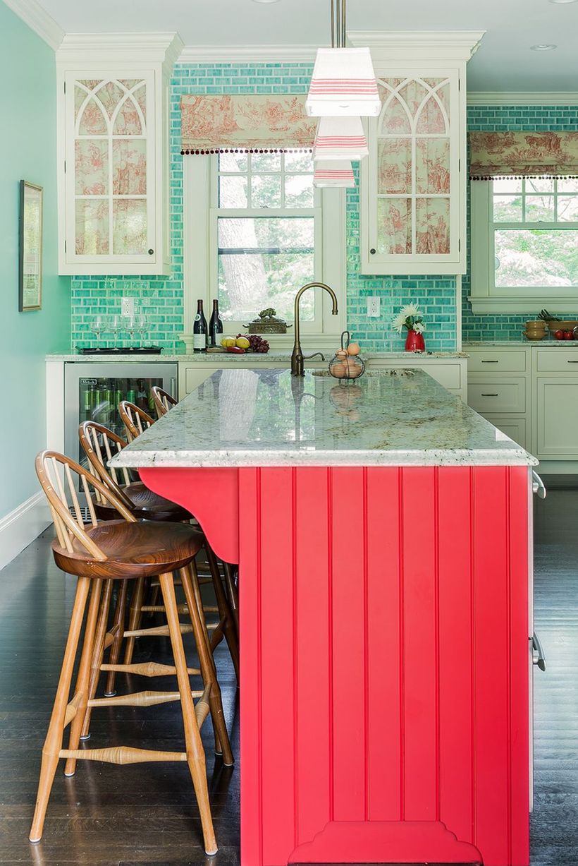 Simple-kitchen-bohemian-style-with-pink-kitchen-island-and-wooden-stool-chair
