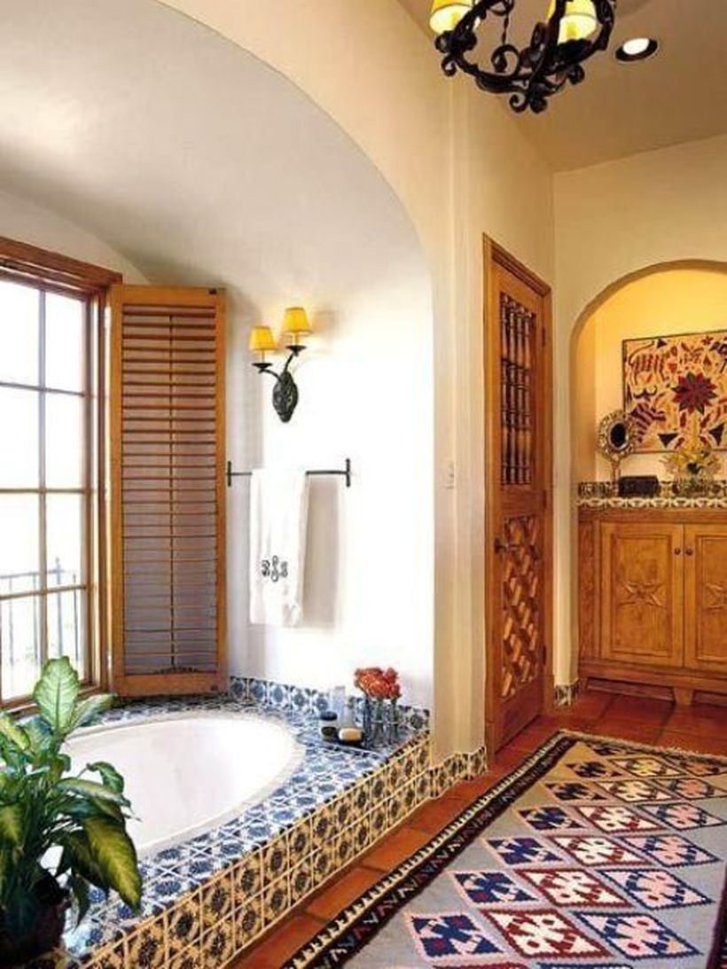 Unique-bathtub-with-a-bohemian-theme-and-add-a-unique-motif-rug