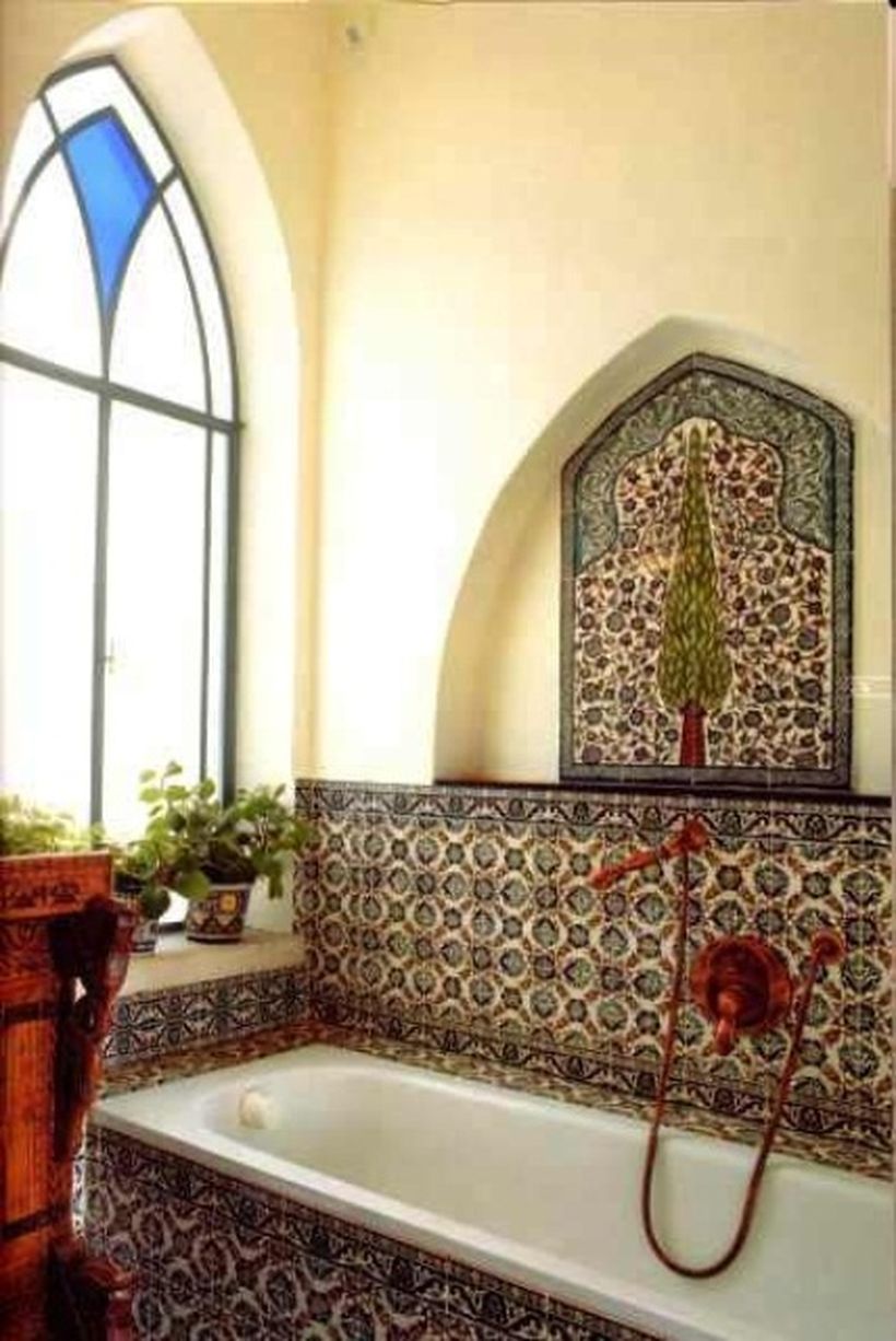 Unique-bathtub-with-a-boho-style-pattern-that-matches-the-wall-for-your-bathroom
