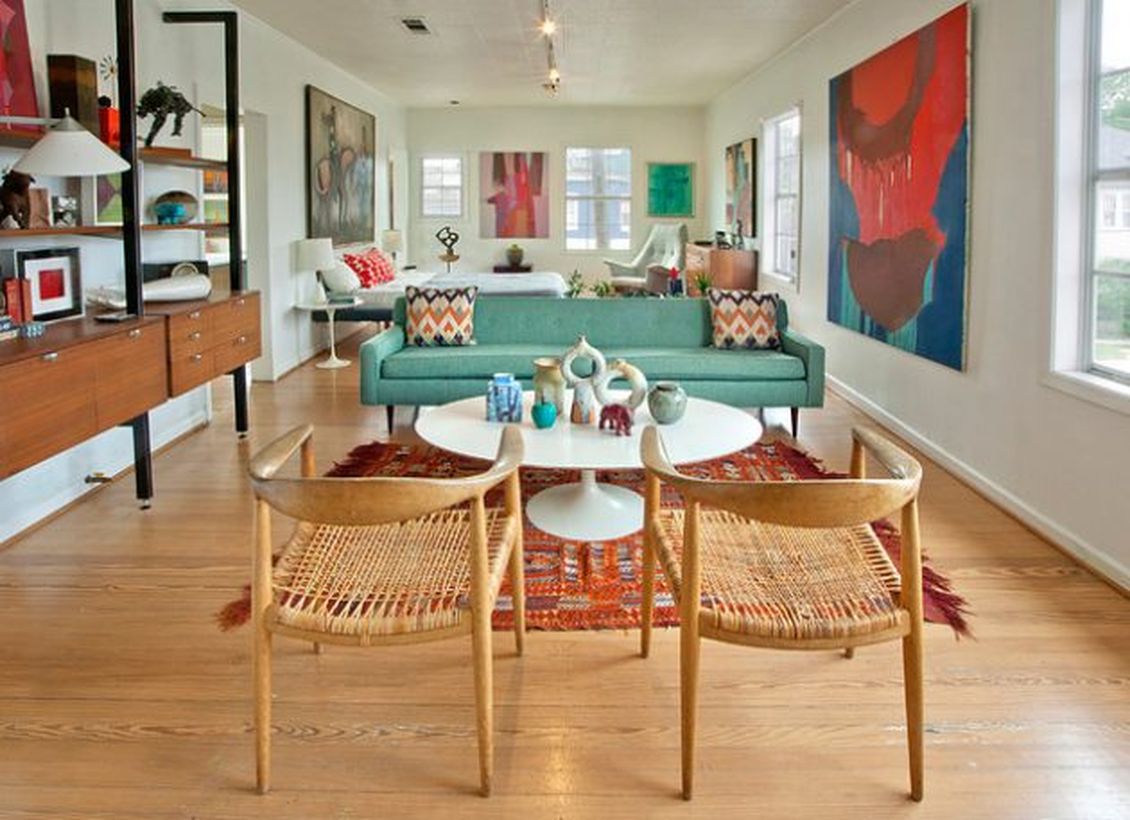Unique-chairs-made-of-rattan-and-wood-with-white-round-coffee-tables-on-top-decorated-with-various-unique-ornaments-for-your-retro-living-room-decoration