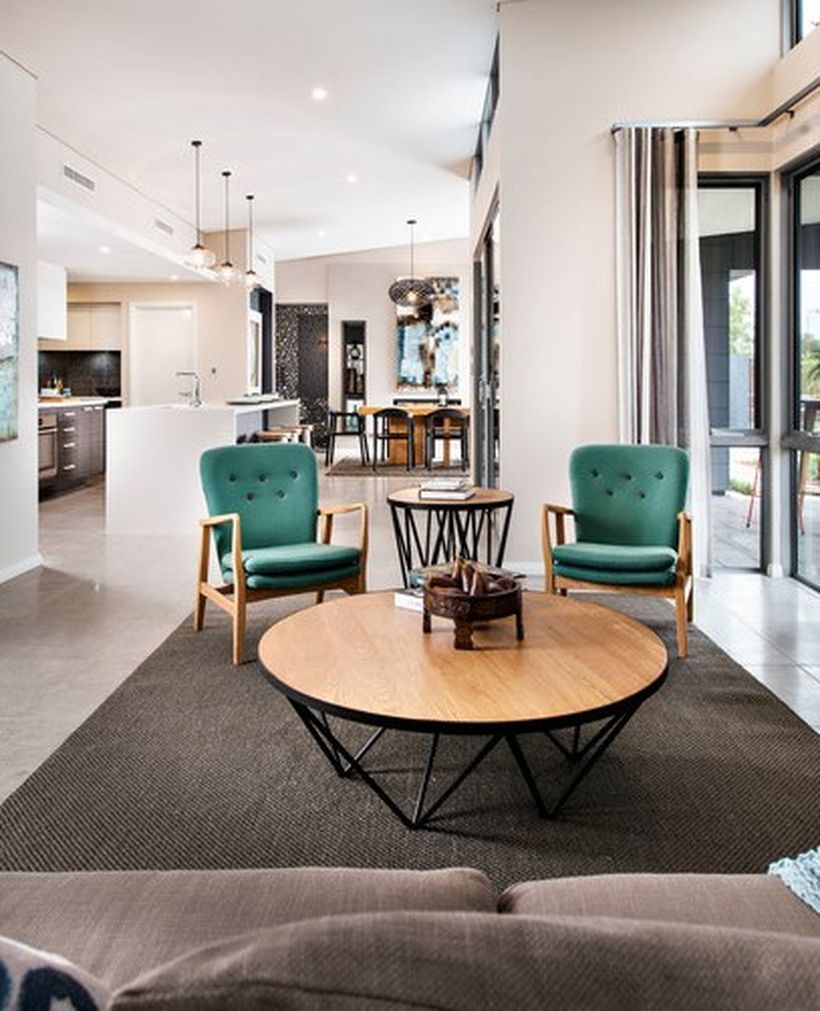 Unique-round-coffee-table-bergaya-retro-untuk-ruang-tamu-anda-with-wooden-frame-chair-and-green-soft-foam-agar-nyaman