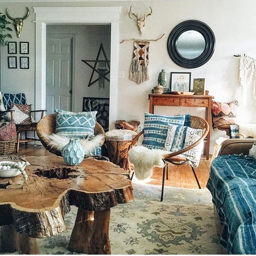 Unique-wooden-coffee-table-and-lazy-chair-to-create-a-bohemian-atmosphere-by-adding-unique-rugs-to-decorate-your-room