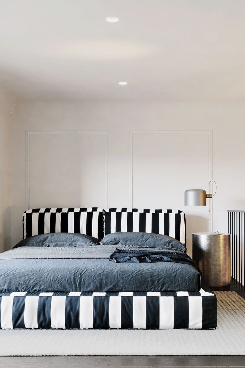 White-and-black-striped-bedroom-with-stainless-night-stand-and-unique-table-lampu-di-samping-tempat-tidur-to-create-good-lighting
