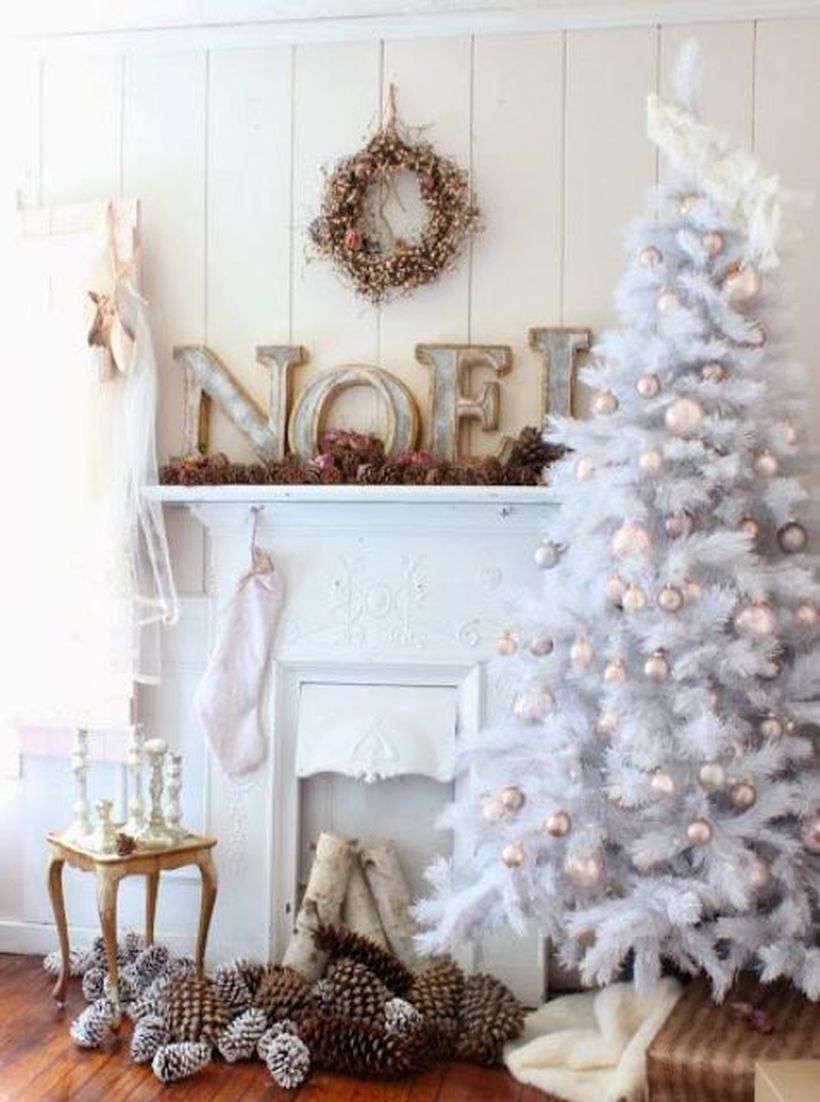 White-tree-with-soft-pastel-bell-ornaments-and-pinecones-for-balanced-decor-in-your-living-room