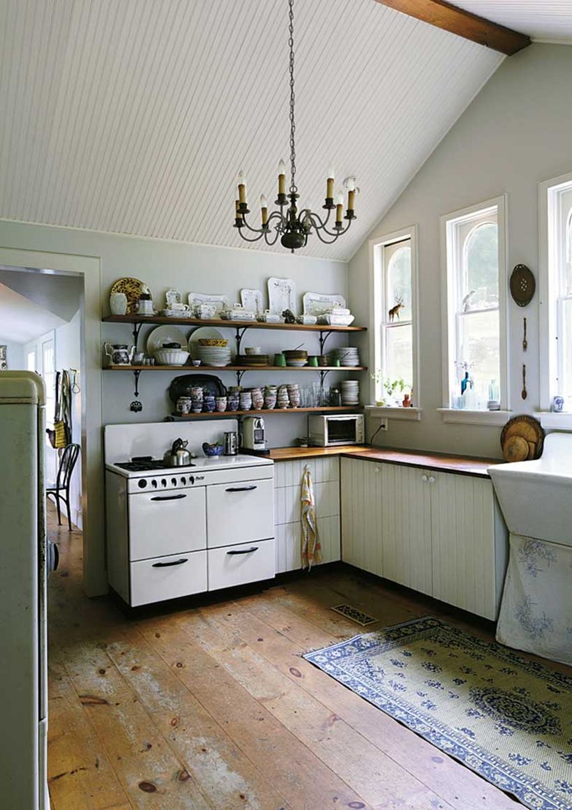 White-wooden-pallet-kitchen-cabinet-and-long-tiered-hanging-rack-to-store-a-variety-of-small-ornaments-for-your-kitchen-you-can-apply