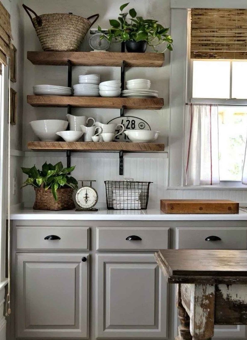 Wooden-thick-hanging-rack-furniture-that-must-be-in-vintage-kitchen-to-store-various-dishes-and-houseplant-at-the-top