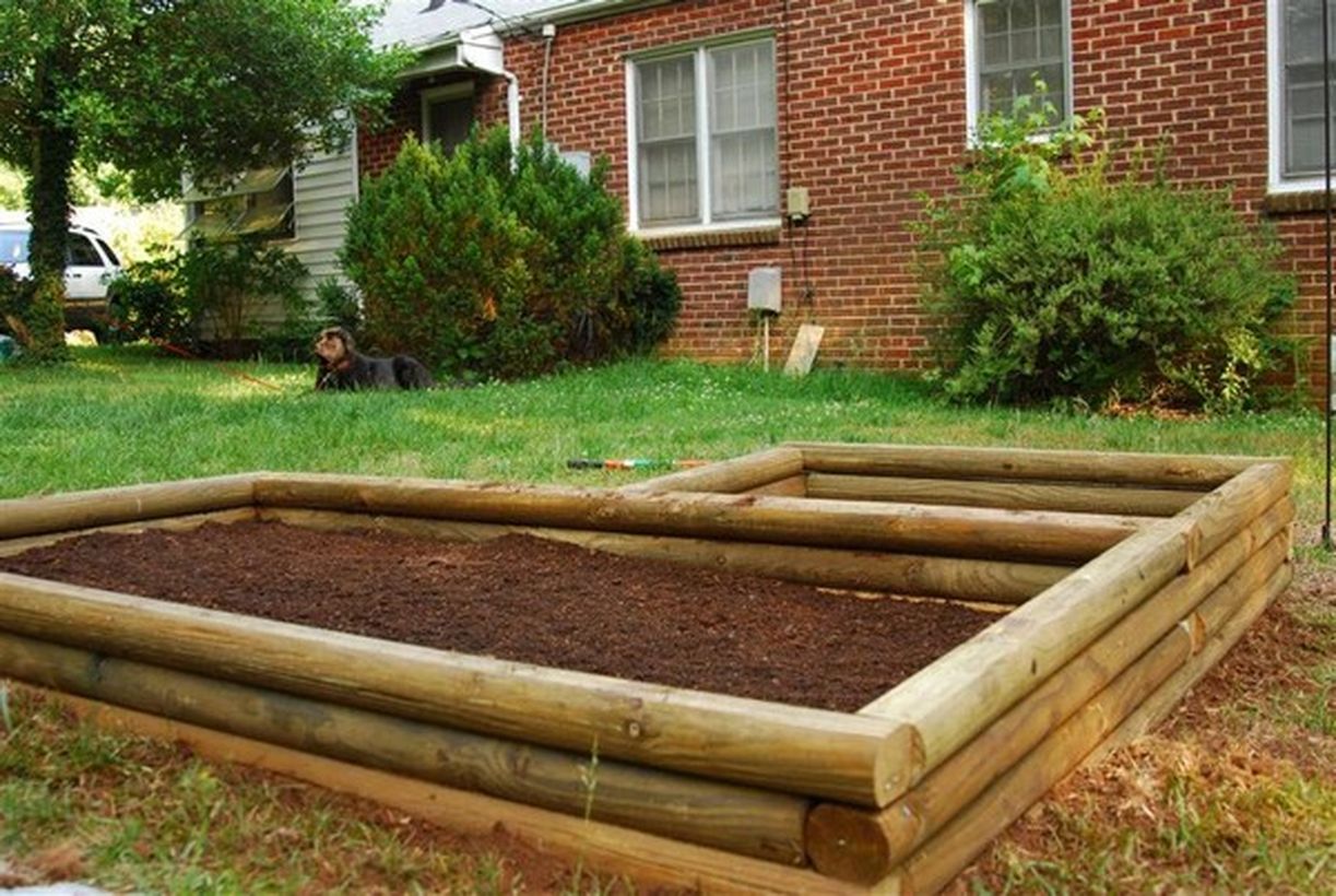 1raised-beds-constructed-from-landscape-timbers-are-perfect-for-separating-the-plants-on-the-backyard.