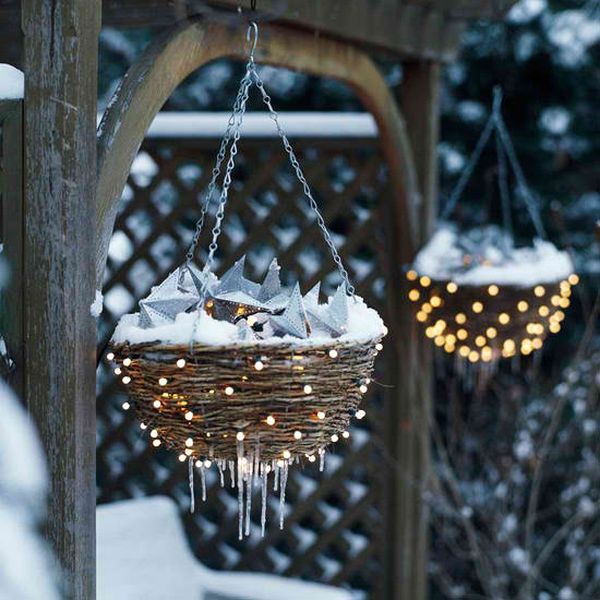 Amazing-outdoor-christmas-decorations.-make-hanging-baskets-sparkle-all-winter-long-by-lighting-them-from-within.-use-coiled-vine-baskets-without-liners.