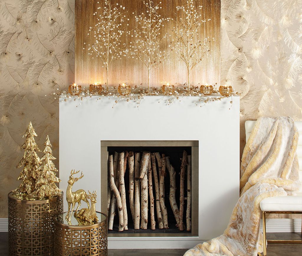 An elegant fireplace with gold decoration