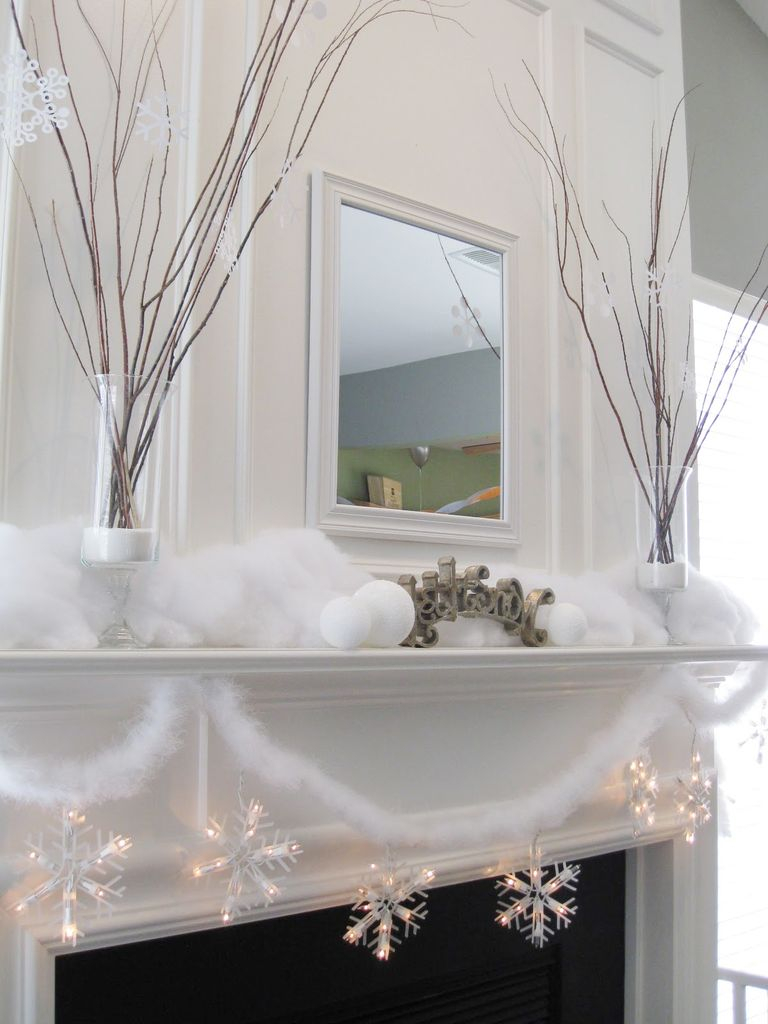 Big fireplace combined with branch decoration above it