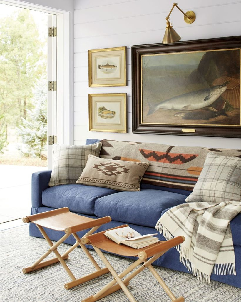 Classic and plaid motif in the gray cushion with blue sofa