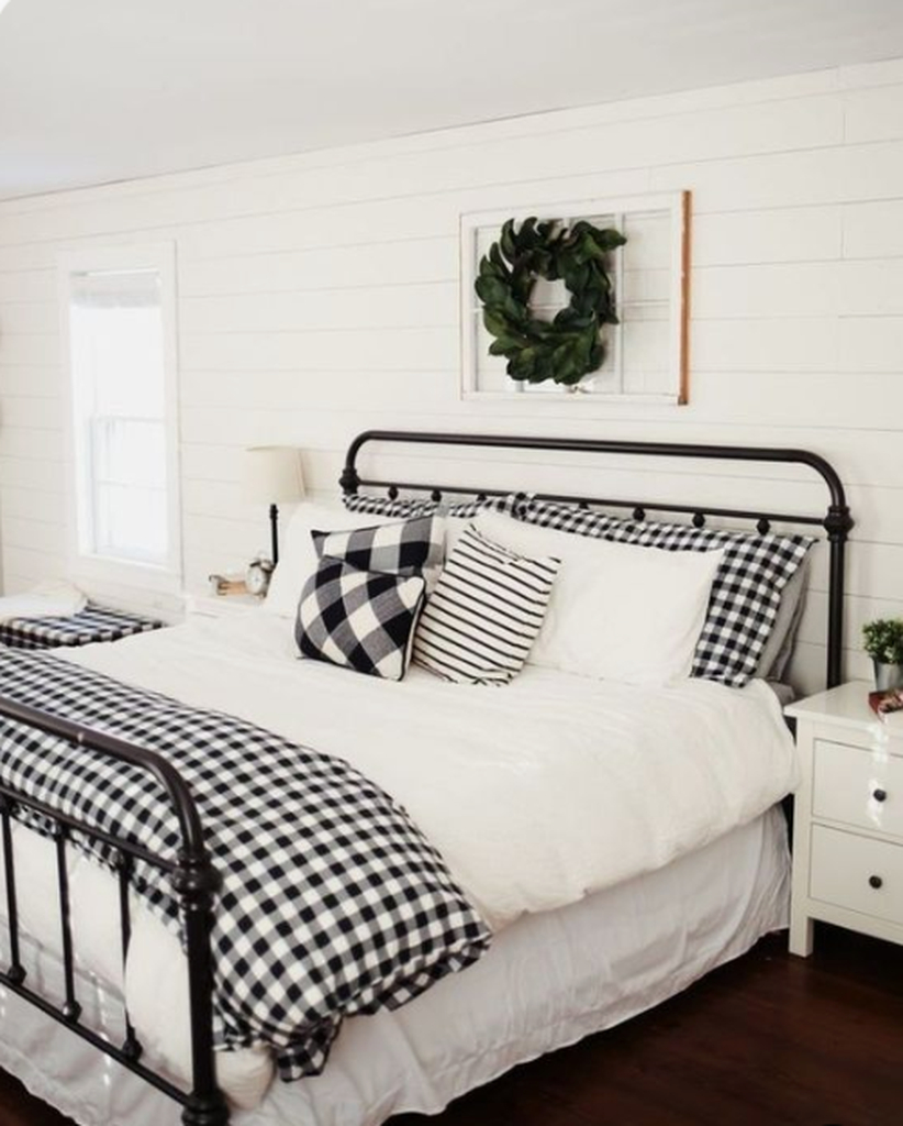 Classic bedroom with a fresh greenery wreath