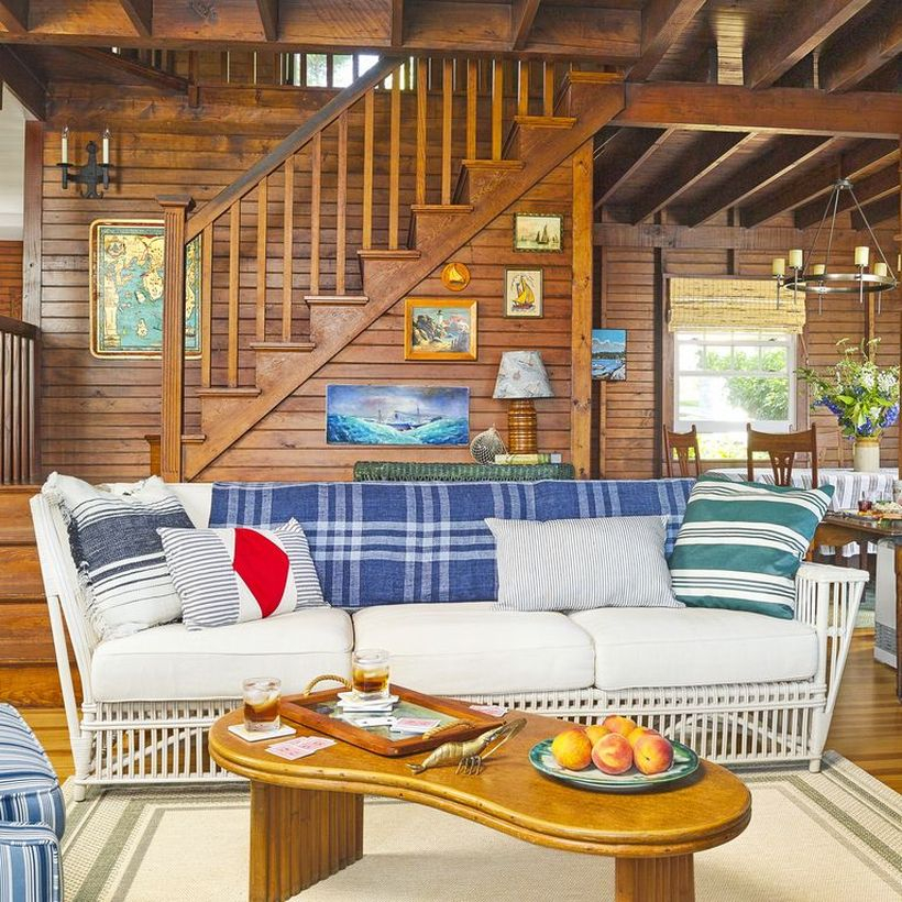 Colorful stripped cushion with white sofa and oval table