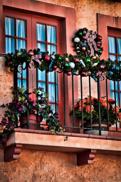 Decorate-the-balcony-with-beautiful-colorful-this-balcony-is-decorated-with-colorful-ornaments-garlands-and-wreath.
