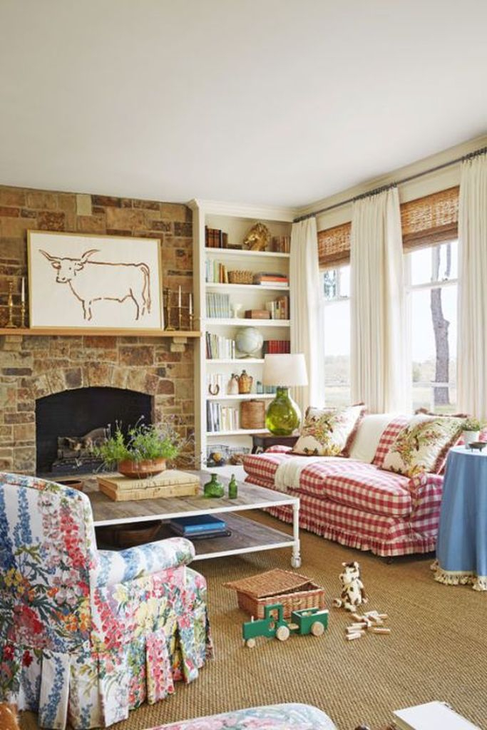 Farmhouse living room design with stone fireplace