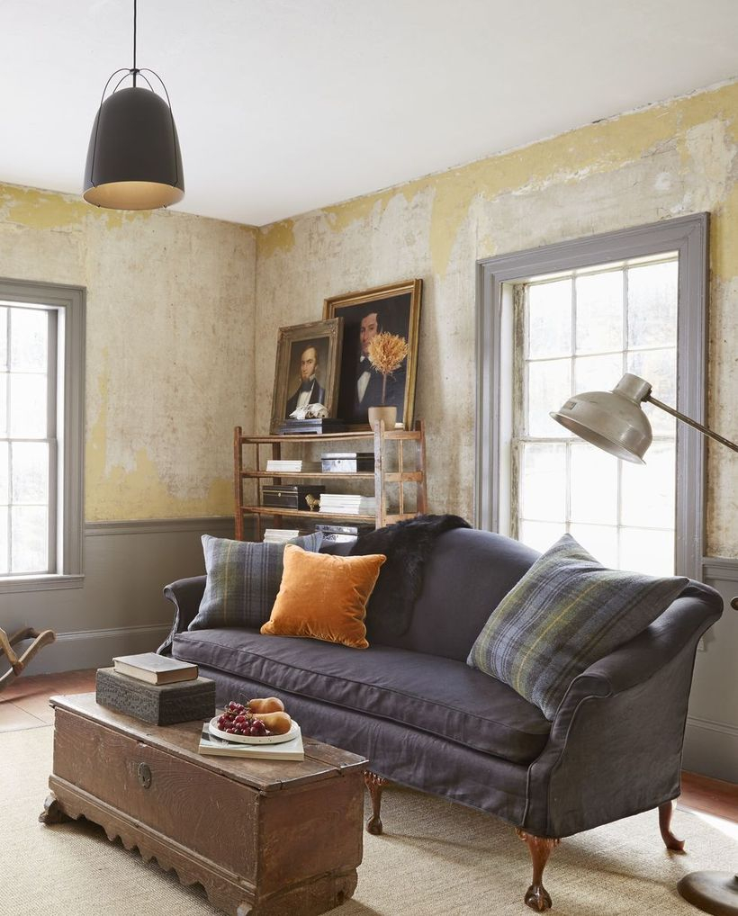 Gray plaid cushion with graysofa and square wooden table