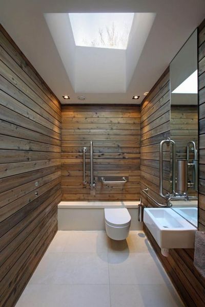 Modern-minimalist-airy-bathroom-with-stained-wood-plank-wall-panel-square-skylight-window-interior-design-ideas-simple-modern-bathroom-design-ideas-683x1024