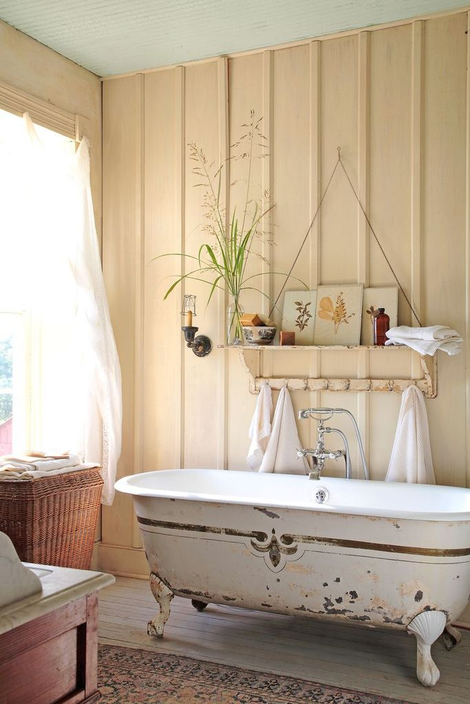 Rustic bathroom with vintage bathtub