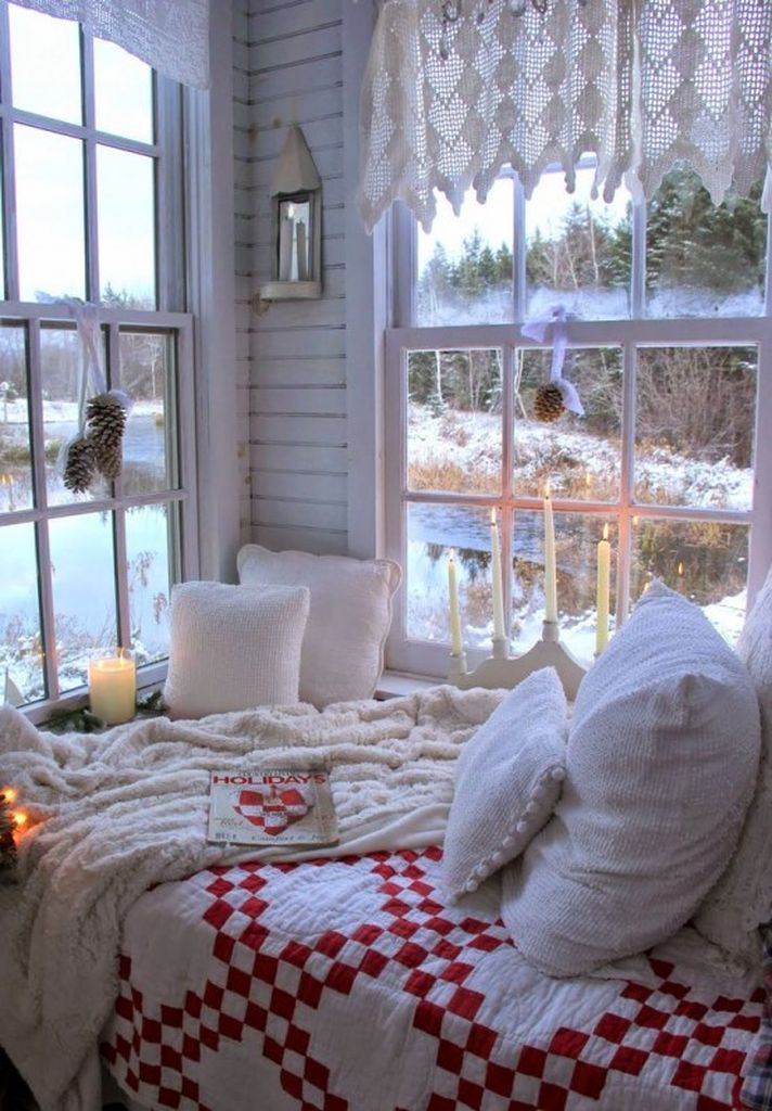 Simple winter bedroom with white crochet curtains and pinecone posies