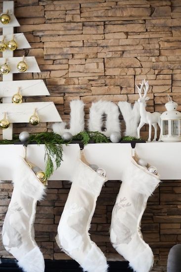 This-fuzzy-mantel-decoration-can-be-made-in-just-10-minutes-thanks-to-some-faux-fur-large-paper-letters-scissors-and-a-hot-glue-gun.