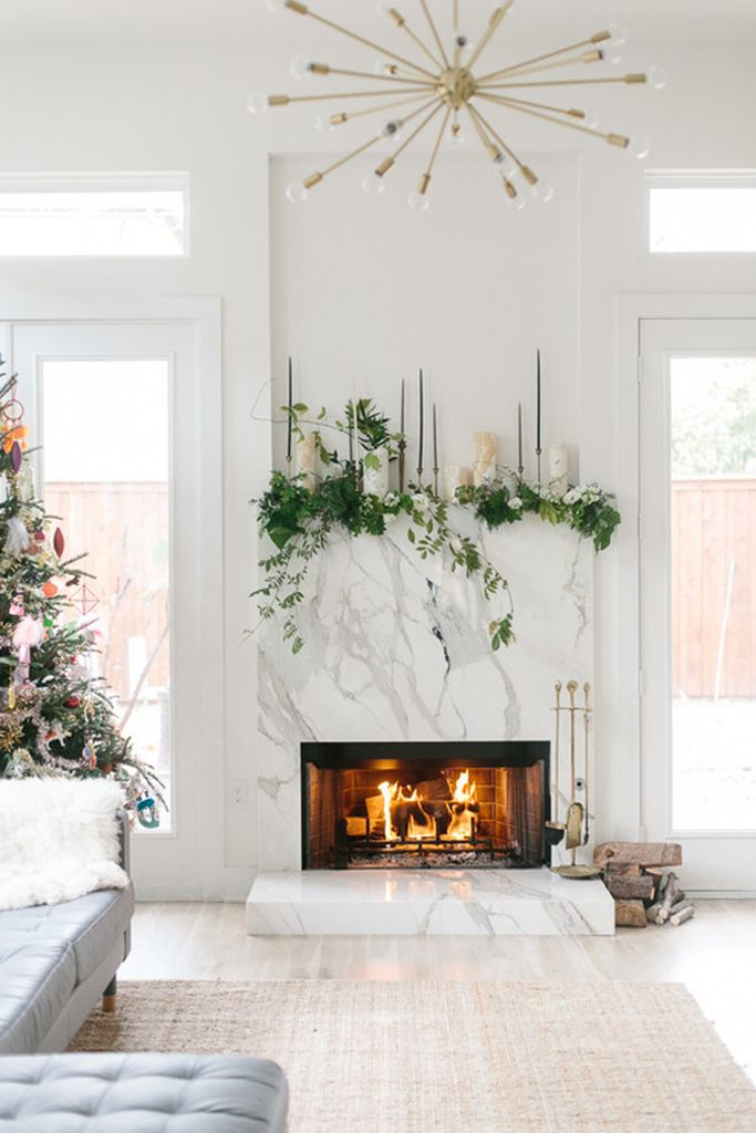 White granite fireplace combined with greenery