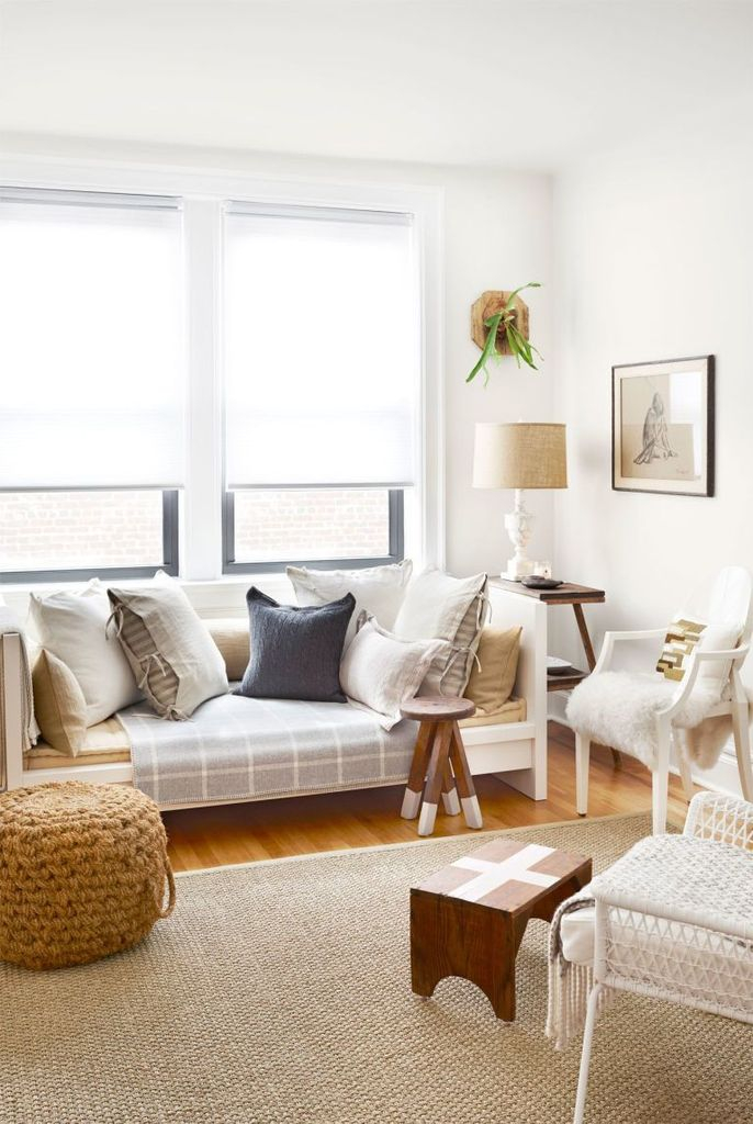 White walls combined with brigth sofa for small living room