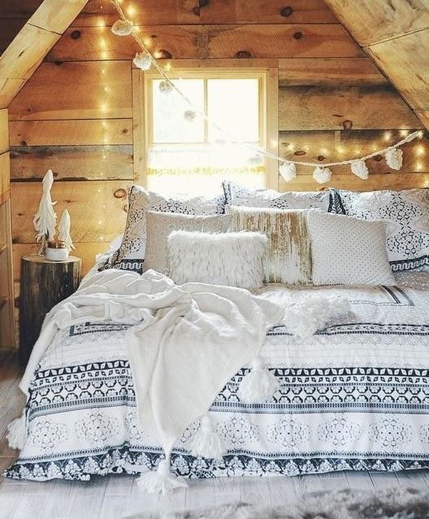 Winter bedroom all clad with rough wood