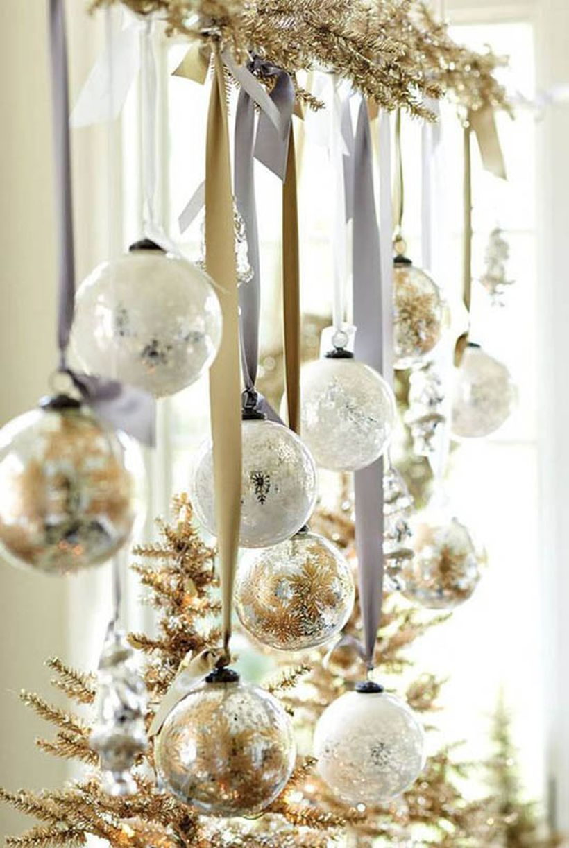 Christmas window with gold and white hanging ornament