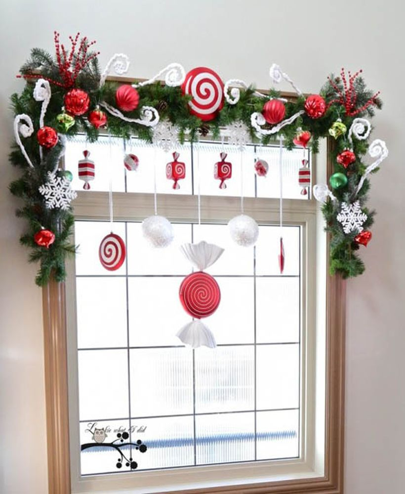 Christmas window with red and white canddy decoration