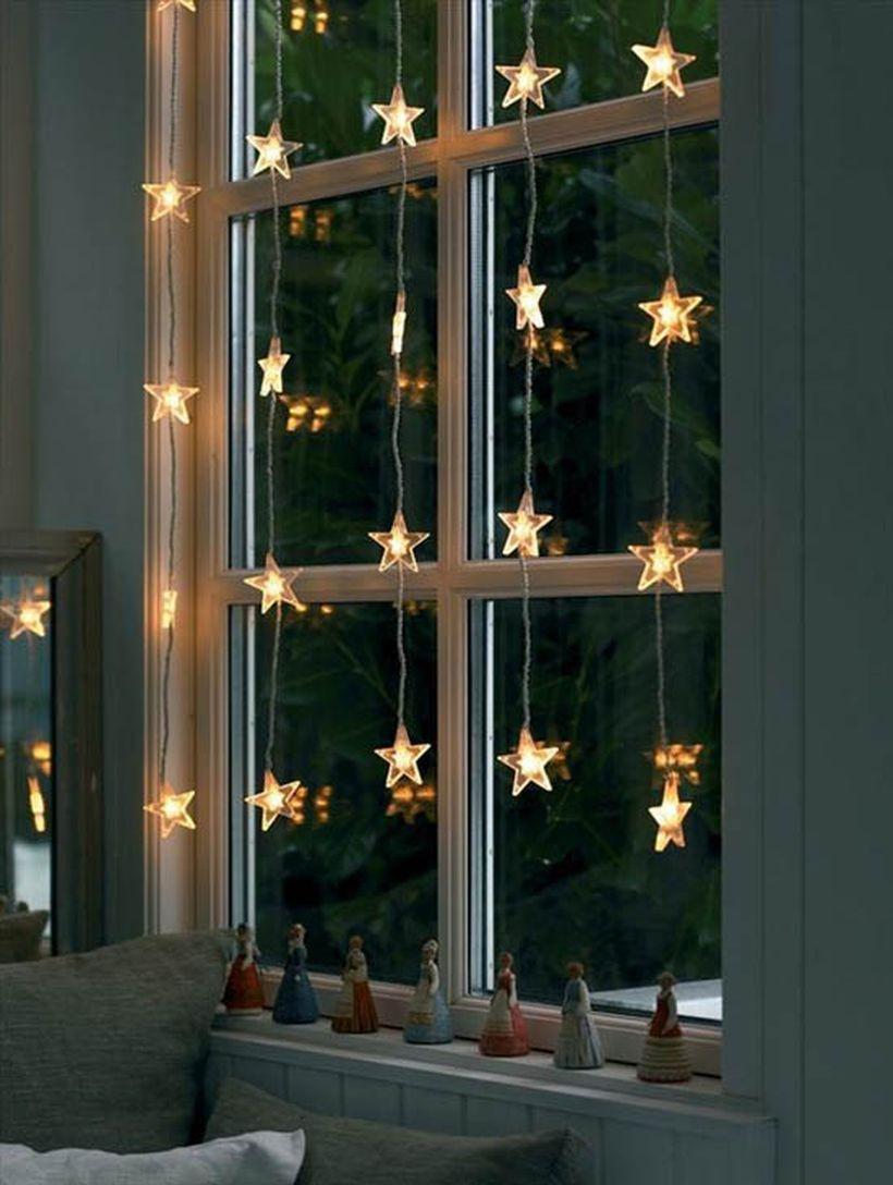 Christmas window with small star light decoration