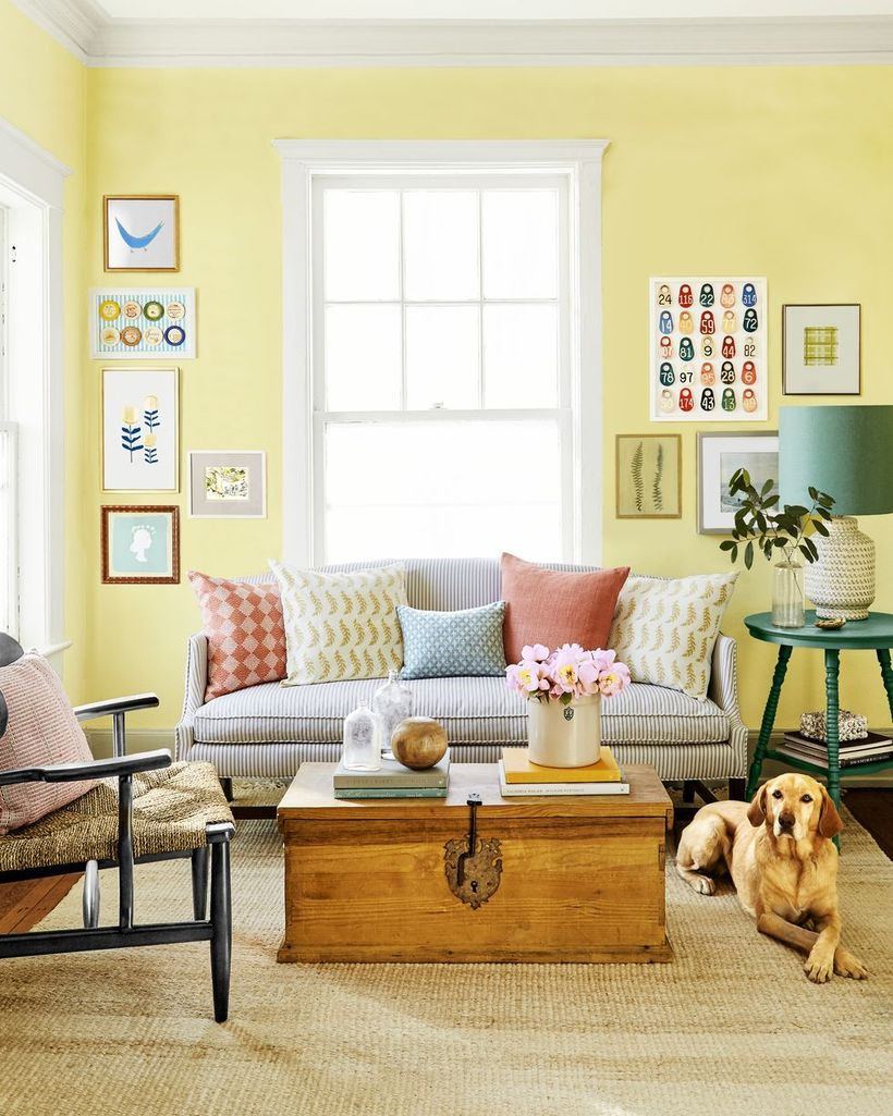 Colorful cushion combine with white sofa and square wooden table