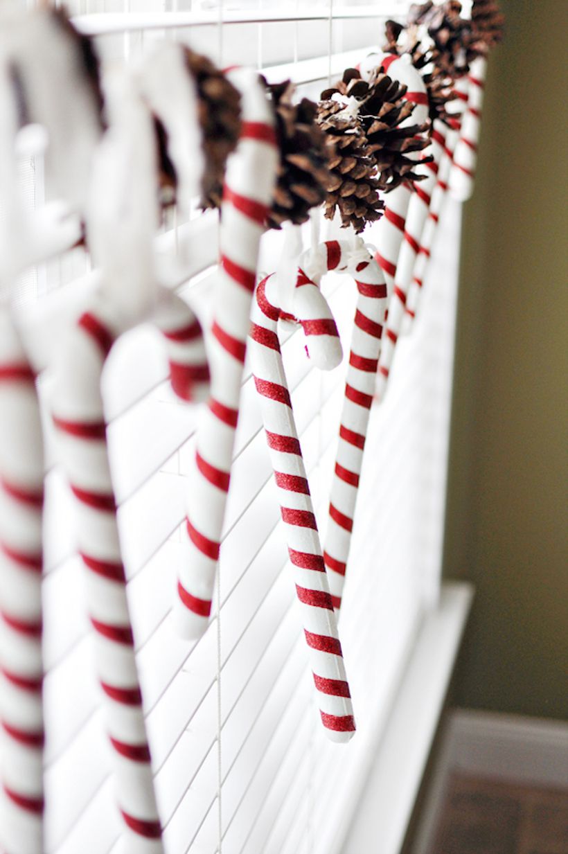 3candy-canes-and-pinecones-hung-in-a-window