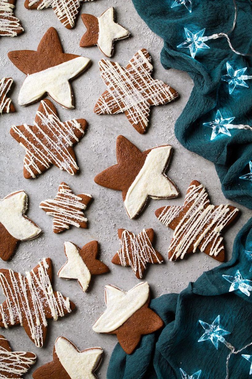 Classic-christmas-décor-ideas-with-white-chocolate-gingerbread-star-cookies.-feel-free-to-add-as-much-or-as-little-as-youd-like.