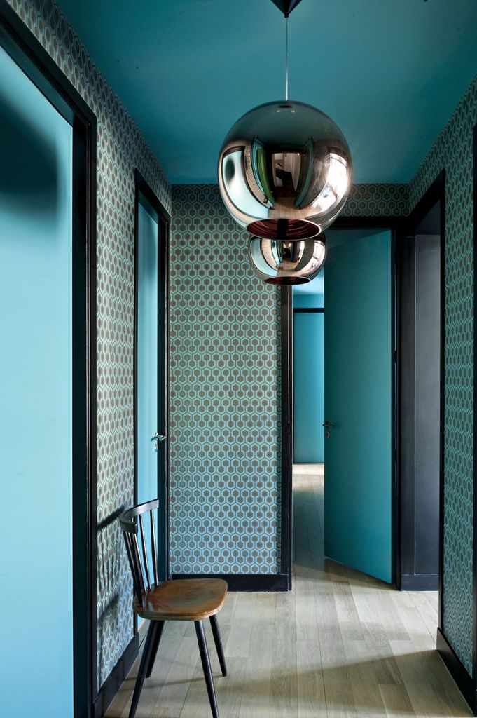 Enjoy the beauty of your entryway with turquoise color. here, you can add wooden flooring to give a natural impression of your entrance.