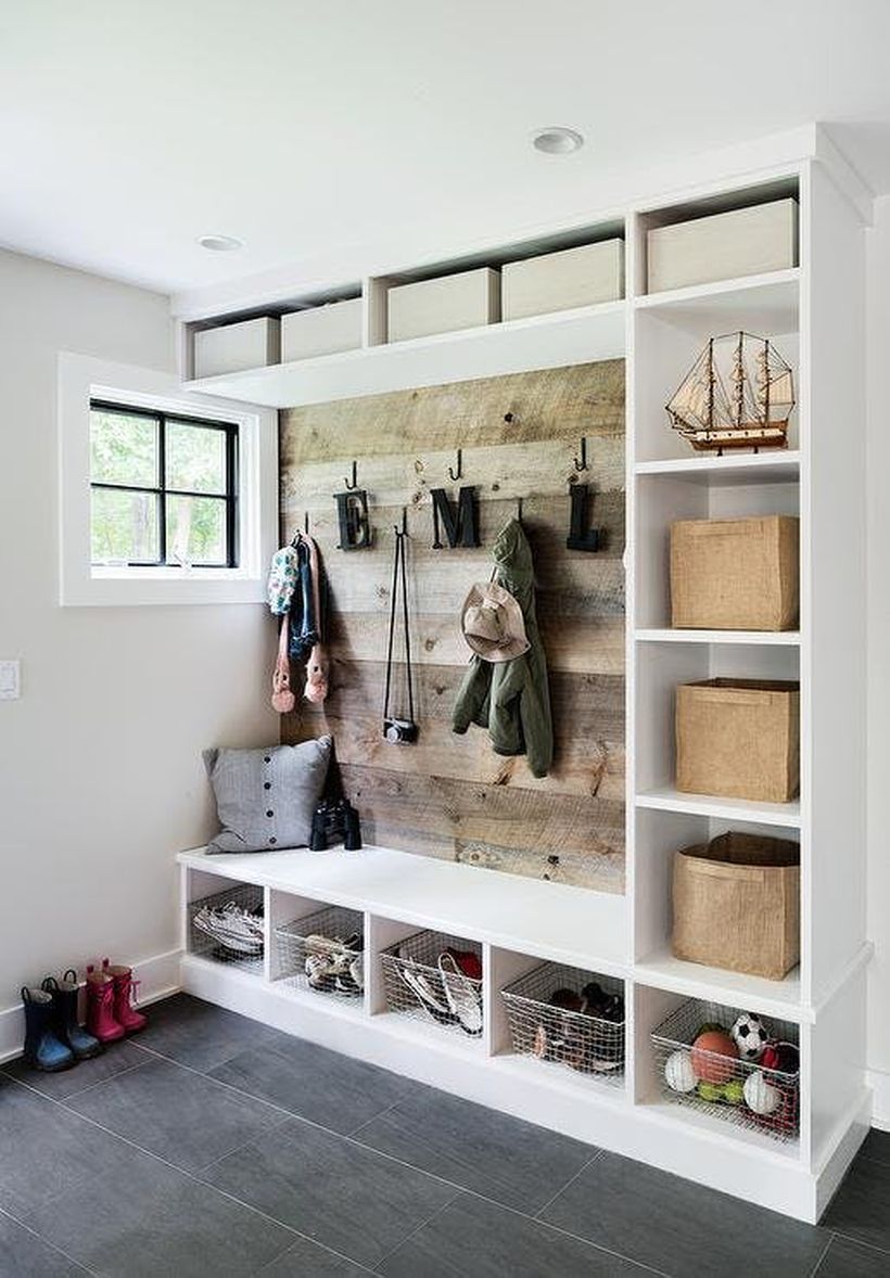 Mudroom-with-rustic-back-wall-via-z-interiors
