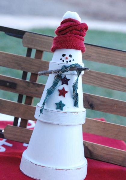 This-terra-cotta-snowman-is-so-easy-that-you’ll-be-done-and-moving-onto-new-projects-in-a-snap.-you-might-even-have-most-of-the-supplies-on-hand.