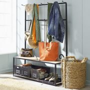 Laundry-basket-storage-under-entryway-bench-seat-with-clothing-and-coat-hooks-beside-rattan-umbrella-stand-ideas-783x783