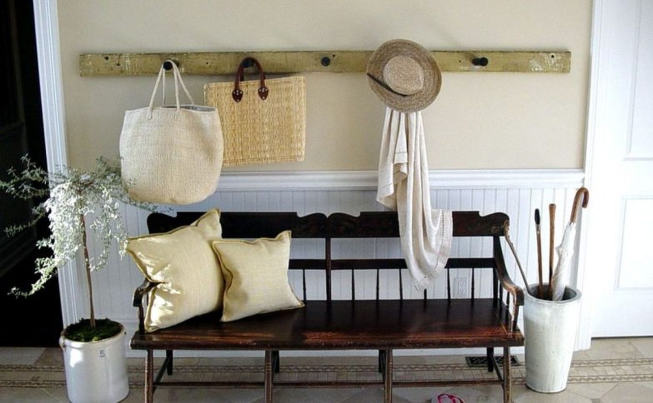 Vintage-and-antique-diy-wooden-bench-seat-with-white-pillow-beside-umbrella-stand-plus-wall-mounted-coat-hooks-and-bag-hooks-ideas-783x484