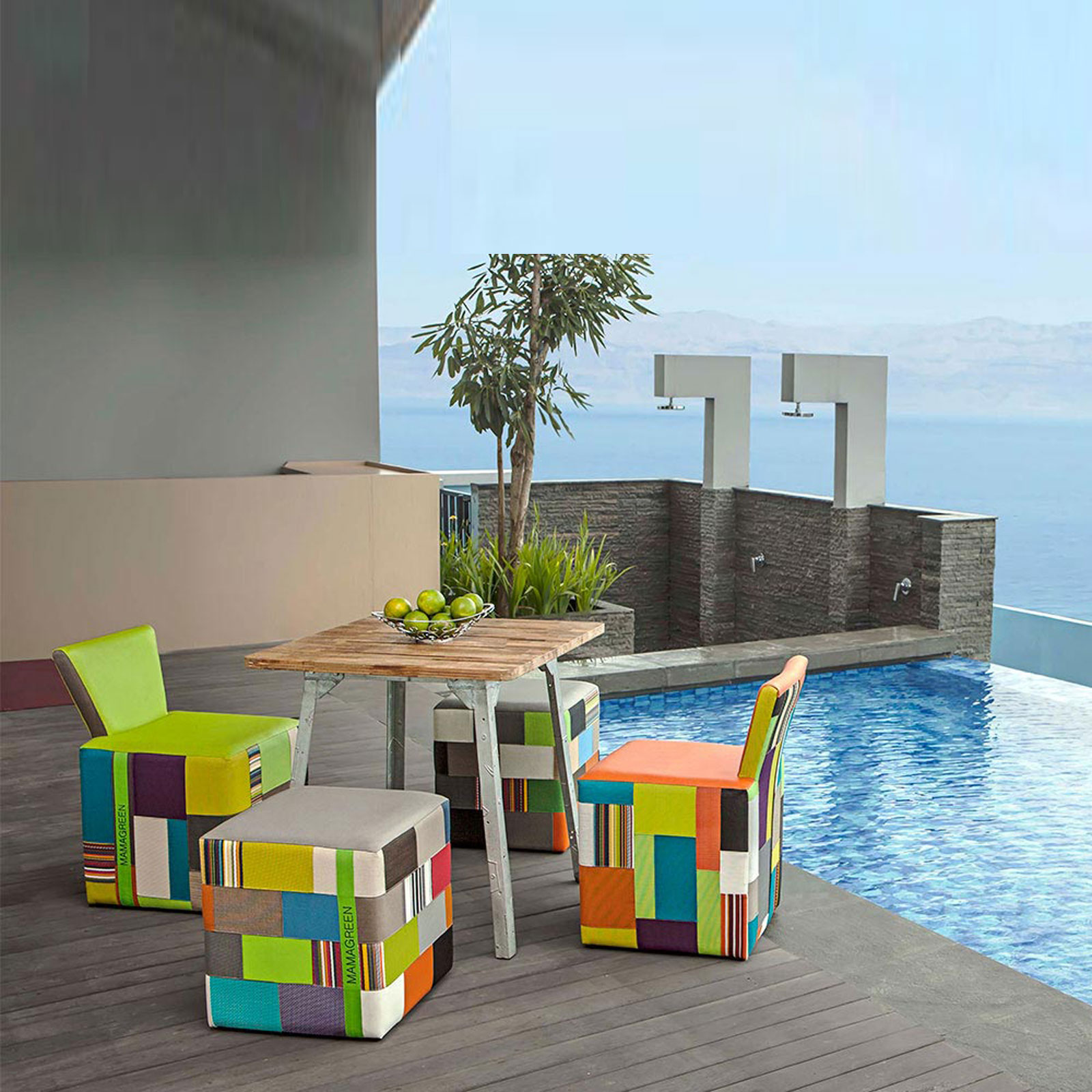 Contemporary-outdoor-furniture-design-with-colorful-decor-and-wooden-table-in-infinity-pool-landscaping-ideas