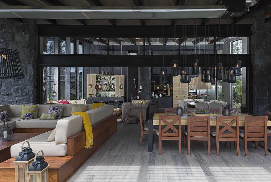 Dark grey house in modern construction of purified lines with rustic touches 3