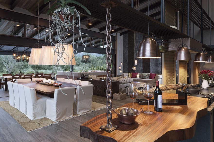 Dark grey house in modern construction of purified lines with rustic touches 4