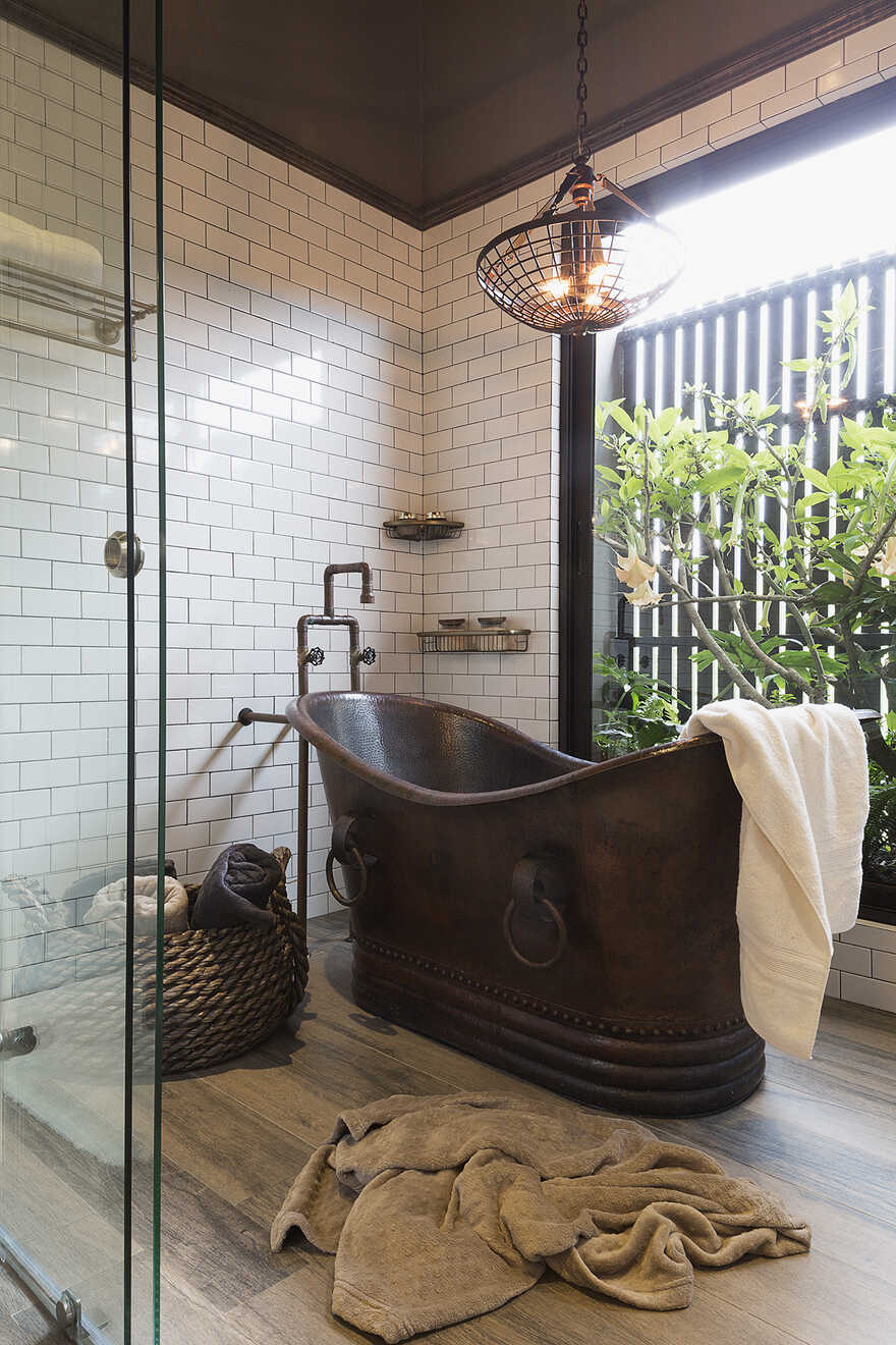 Dark grey house in modern construction of purified lines with rustic touches 6