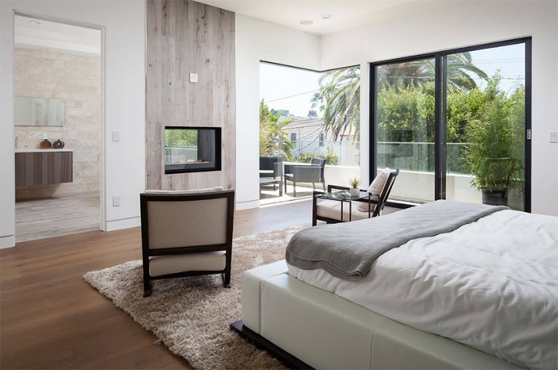 A double-sided fireplace built-in the wall