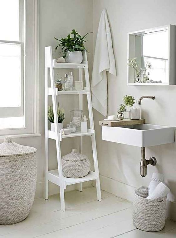 08-a-white-vintage-ladder-for-bathroom-storage-is-a-perfect-idea-for-a-neutral-space