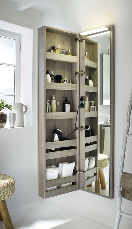 11-a-comfortable-storage-piece-with-a-mirror-door-is-a-popular-option-for-bathrooms