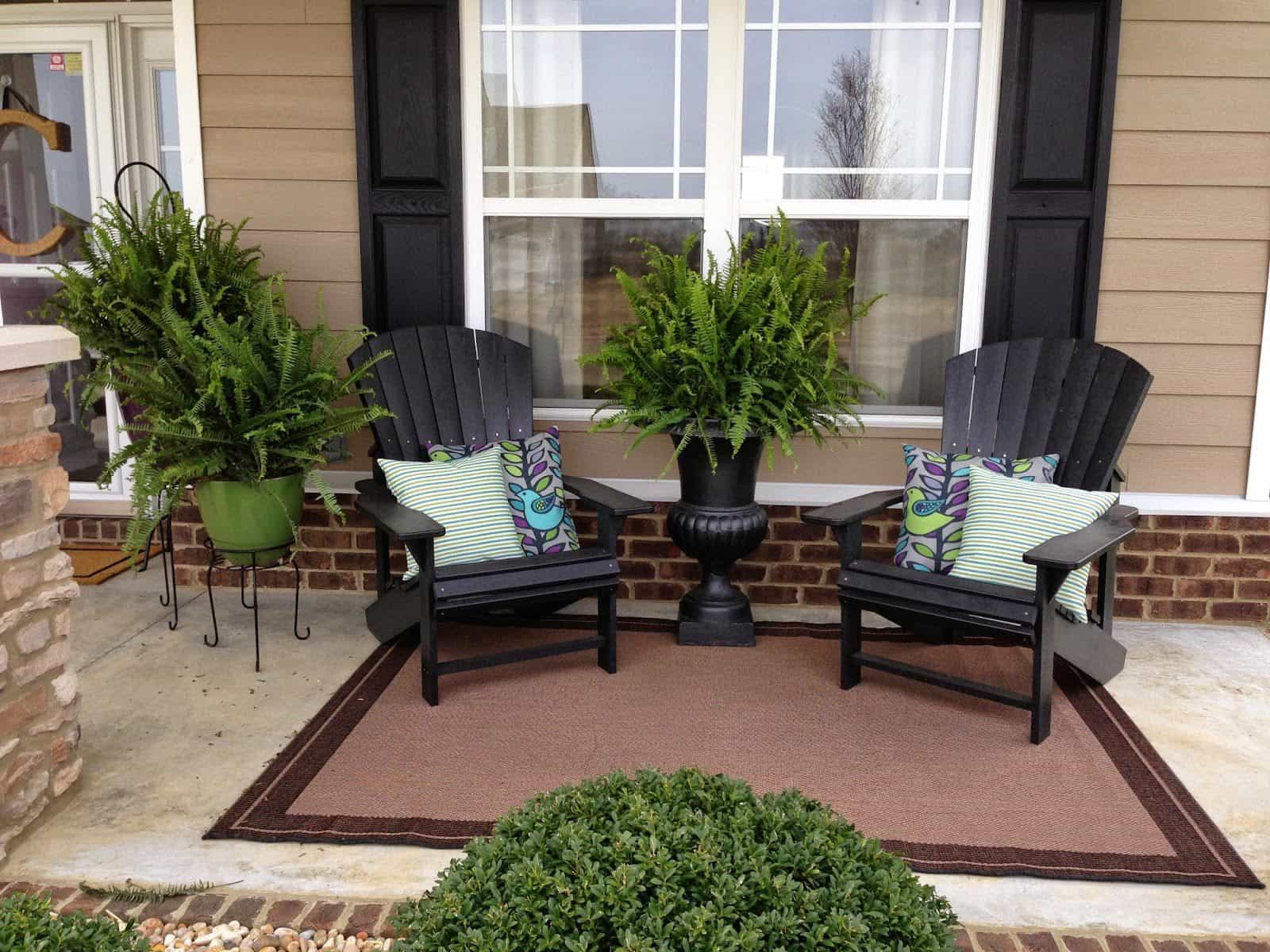 Front-porch-decorated-with-adirondack-chairs-and-potted-plants_home-elements-and-style