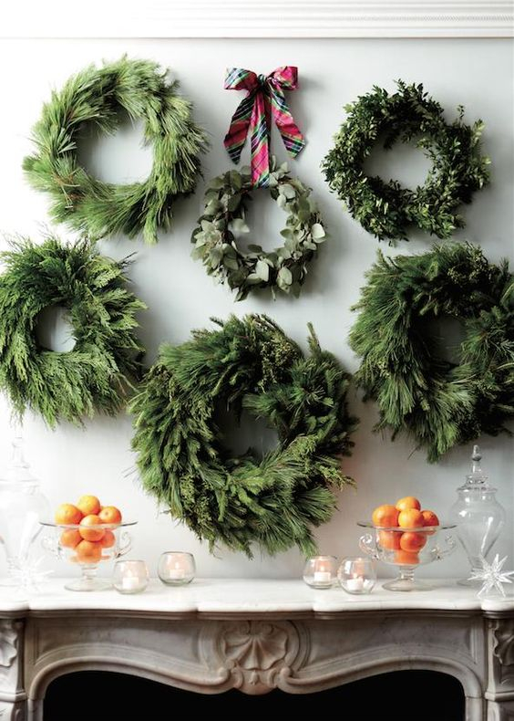 02-a-gallery-of-wall-wreaths-to-highlight-your-mantel-or-home-bar-at-the-party
